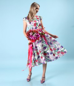 Elegant dress made of cotton veil printed with floral motifs