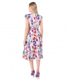 Elegant dress made of cotton veil printed with floral motifs