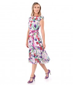 Elegant dress made of cotton veil printed with floral motifs