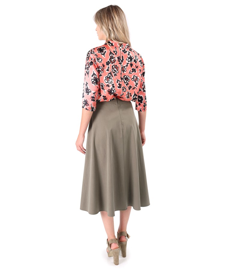 Elegant outfit with natural silk blouse and flared skirt