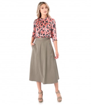 Elegant outfit with natural silk blouse and flared skirt