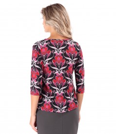 Elastic jersey blouse printed with floral motifs