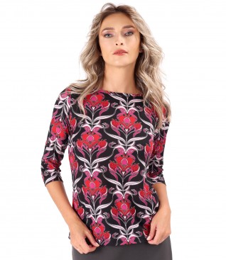 Elastic jersey blouse printed with floral motifs