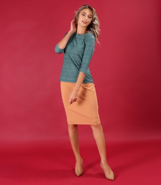 Elegant outfit with elastic jersey blouse and office skirt