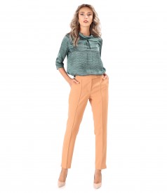 Office outfit with natural silk blouse and ankle pants