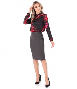 Elegant outfit with blouse and tapered skirt