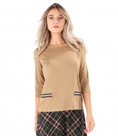 Elastic jersey blouse with gold elastic at the waist