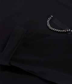 Elastic jersey blouse with decorative chain on the front