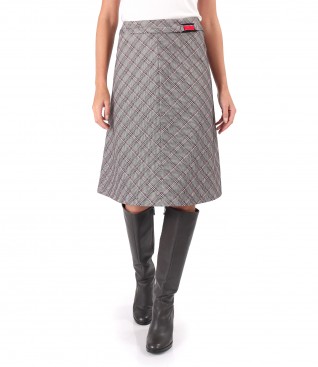 Flared plaid skirt with a buckle at the waist