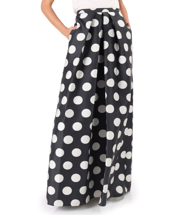 Long skirt printed with polka dots and side pockets