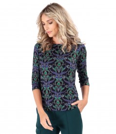 Elastic jersey blouse printed with floral motifs