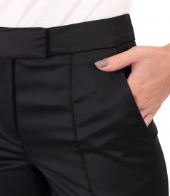 Elegant pants made of elastic satin with zippers on the hem