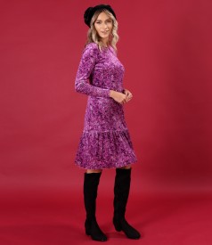 Elastic velvet dress printed with floral motifs