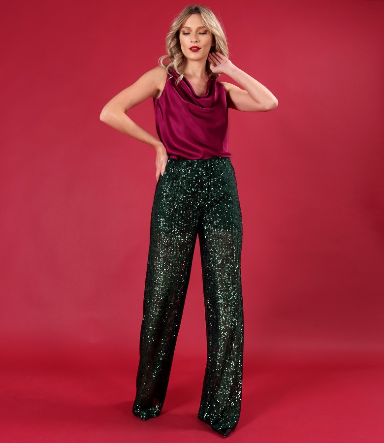 Elegant outfit with sequined pants and viscose satin blouse
