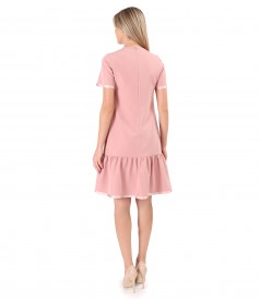 Elegant dress with a ruffle and satin ribbon at the end