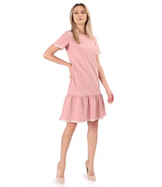 Elegant dress with a ruffle and satin ribbon at the end