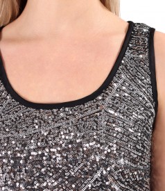 Sleeveless sequin blouse with satin trimming