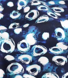 Elastic cotton dress printed with geometric motifs
