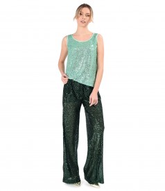 Elegant outfit with sequined blouse and pants
