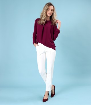 Office outfit with blouse with pleats on the front and ankle pants