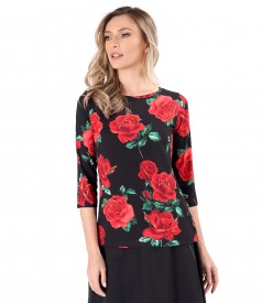 Elastic jersey blouse printed with floral motifs