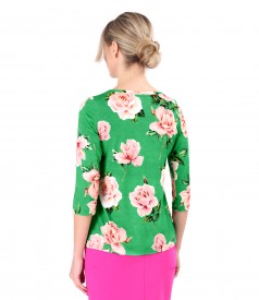 Elastic jersey blouse printed with floral motifs