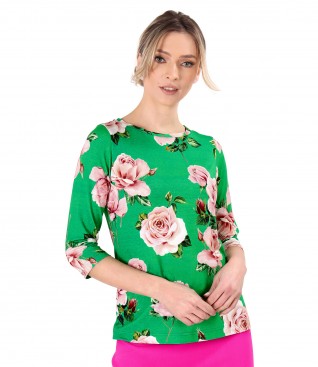 Elastic jersey blouse printed with floral motifs