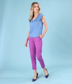 Elastic jersey blouse with flowers applied to the neckline