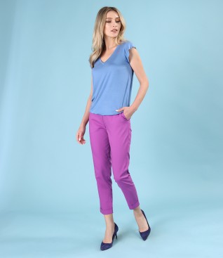 Elegant outfit with jersey blouse and ankle pants