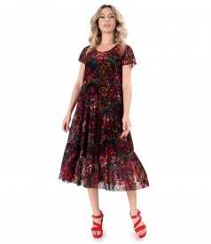 Midi dress in elastic tulle embroidered with velvet with floral motifs