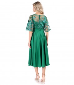 Elegant midi dress in satin with bodice and lace sleeves with sequins