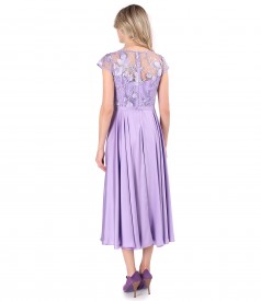 Elegant midi dress made of satin with sequined lace bodice
