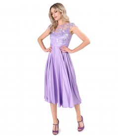 Elegant midi dress made of satin with sequined lace bodice