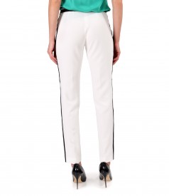 Ankle pants with a stripe on the side and elastic with crystals at the waist