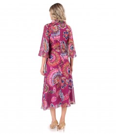 Elegant midi dress made of veil printed with floral motifs