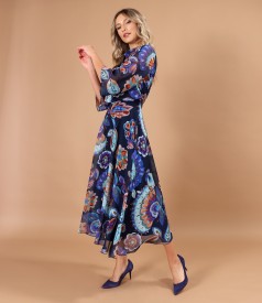 Elegant midi dress made of veil printed with floral motifs