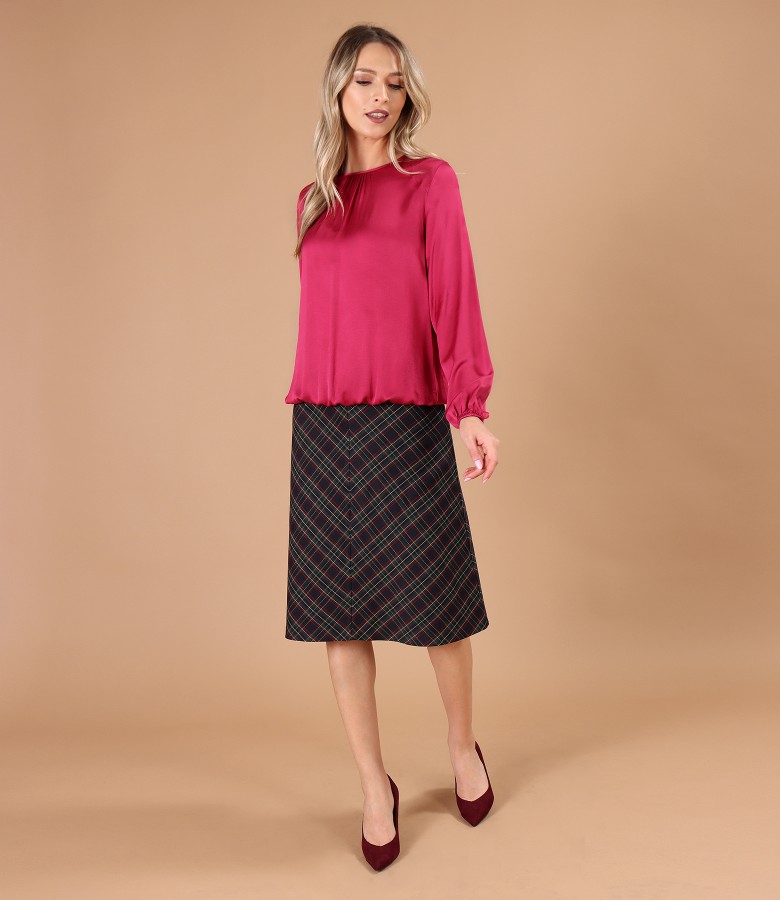Elegant outfit with flared checked skirt and viscose satin blouse