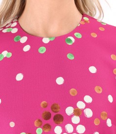 Elegant dress with frill made of elastic fabric printed with polka dots