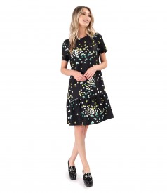 Elegant dress with frill made of elastic fabric printed with polka dots