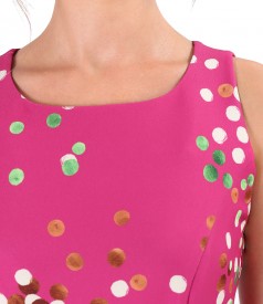 Elegant dress made of elastic fabric printed with polka dots