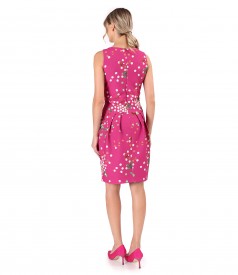 Elegant dress made of elastic fabric printed with polka dots