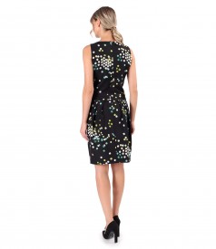 Elegant dress made of elastic fabric printed with polka dots