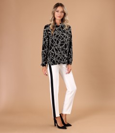 Viscose blouse printed with geometric motifs and pearls at the neckline