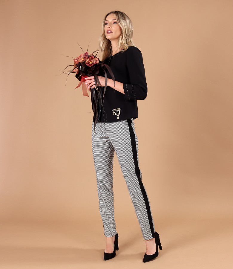 Womens office suit with ankle pants and jacket with a brooch at the waist