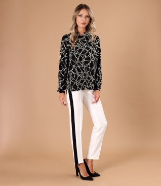 Elegant outfit with viscose blouse and ankle pants with contrast stripe