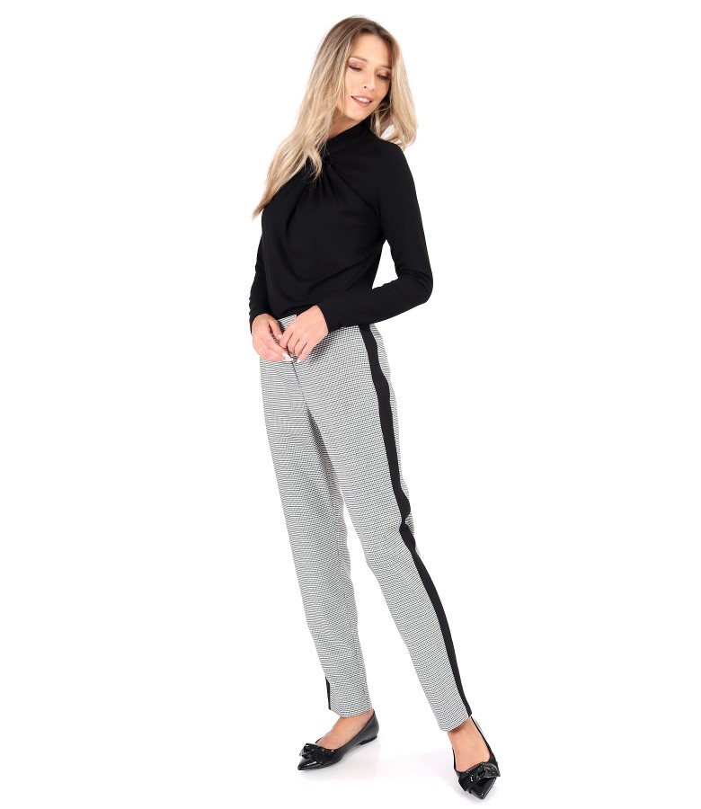 Ankle pants and blouse with folds at the neckline