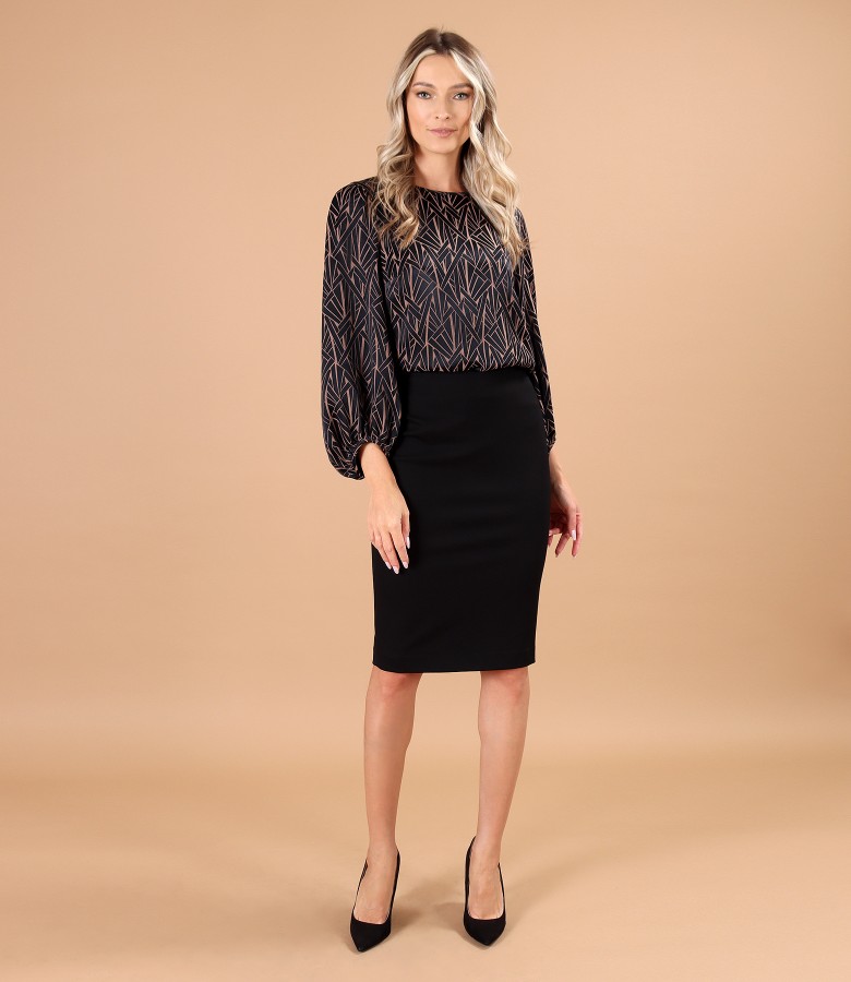 Elegant outfit with tapered skirt and blouse with wide sleeves