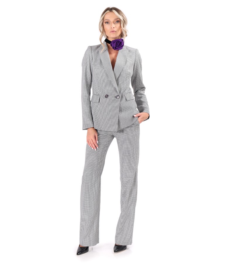 Womens office suit with jacket and pants made of elastic fabric with viscose and satin flower