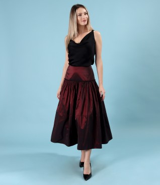 Elegant outfit with taffeta midi skirt and pleated blouse