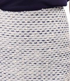 Slightly flared skirt made of cotton loops with metallic thread